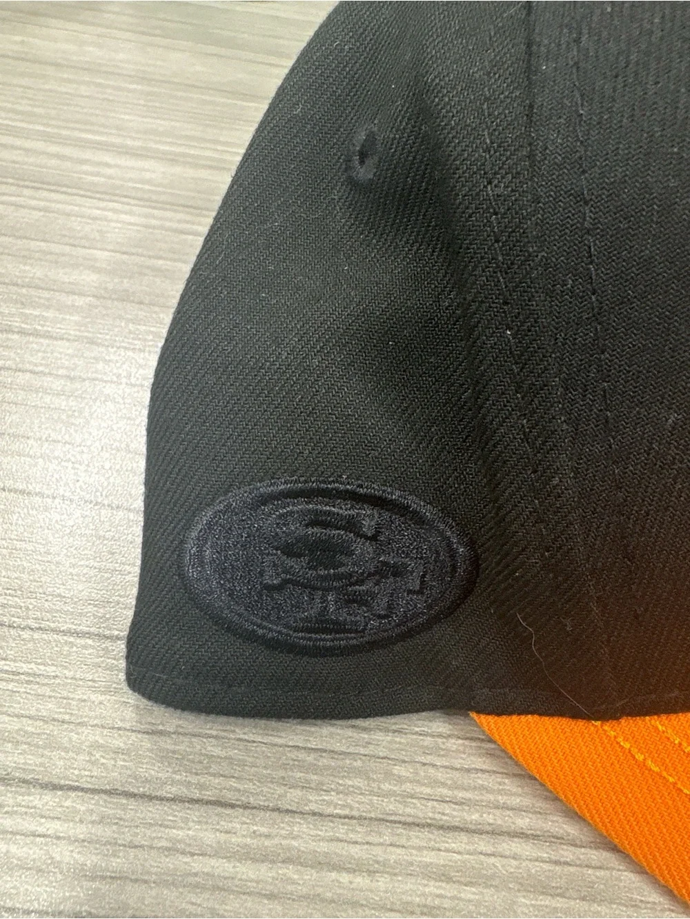 New Era Kids Orange and Black Baseball Cap with Green Embroidery